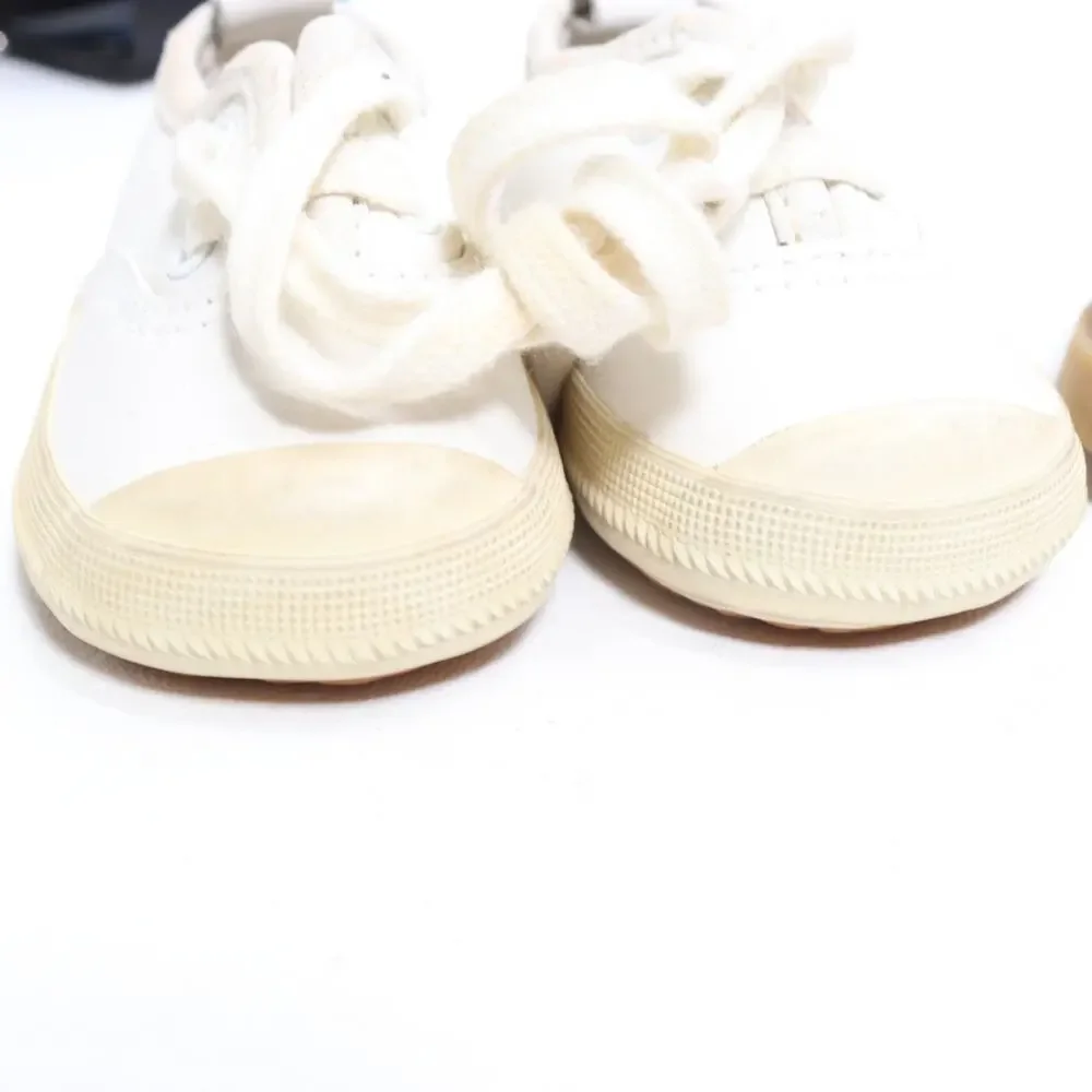 Boots pair sneakers